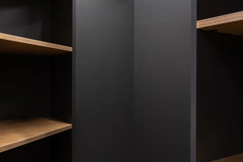 Interior shelves and hanging space of a wardrobe